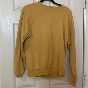 Yellow crew neck sweatshirt